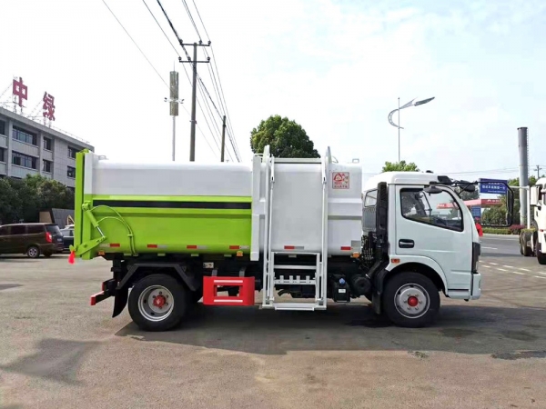 國(guó)六【10立方】 多利卡D7右側(cè)掛桶垃圾車 國(guó)六【10立方】 多利卡D7右側(cè)掛桶垃圾車